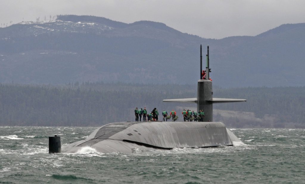 The USS Ohio sailing in the Strait of Juan de Fuca. The Trident nuclear submarine has been converted to a guided missile submarine. It was first launched in 1979, and was the original nuclear submarine in the U.S. Pacific Fleet stationed at what is now Naval Base Kitsap. (Steve Ringman/The Seattle Times)